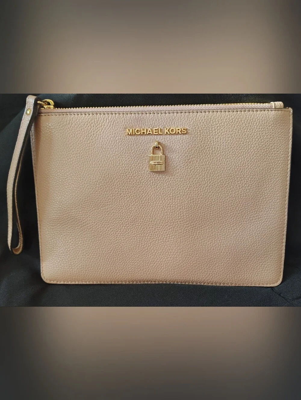 Michael Kors XL Wristlet Pebbled Leather with Gold Tone Lock Detail.